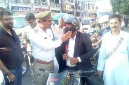 Man given rose by police for wearing helmet, gets into fight with suspicious wife