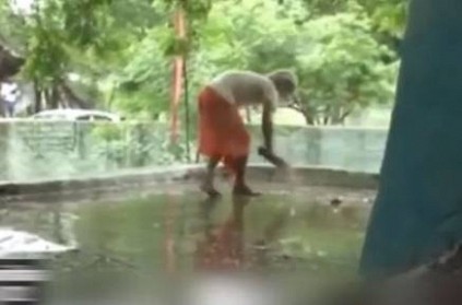 Priest purifies temple after woman visits