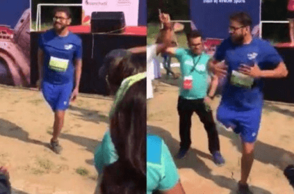 Differently abled man dances after completing 10 km marathon