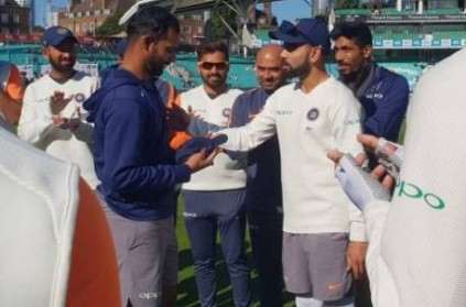 This player makes international Test debut; receives cap from Kohli