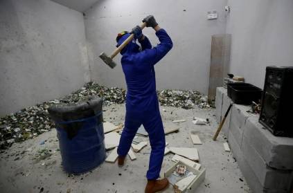 china man opens anger room to break things and get rid off