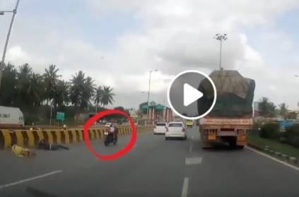 Watch Video: Child escape from strange accident in Bangalore highways