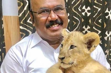 D Jayakumar visits Japan and holds lion cub, writes poem