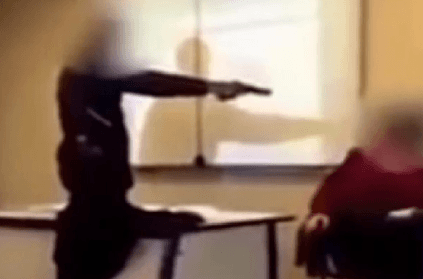 Student holds teacher at gunpoint
